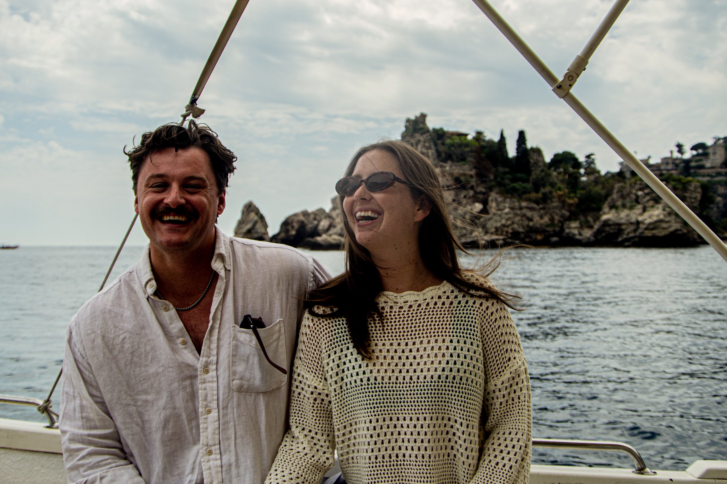 Guests enjoying a private boat experience in Taormina
